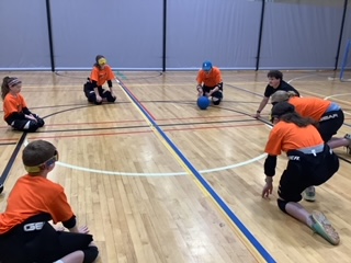 MOBALE athletes practicing goalball passing drill