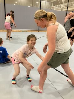 MOBALE athletes wrestling on the mat